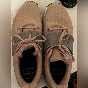 Nike walking shoes. Never worn. I can’t wear them due to feet swelling.